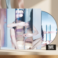 BVRS con picture disc y entorno luminoso azul y rosa