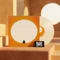 BVRS con portada naranja, vinilo crema y tarjeta oficial