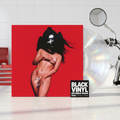 BVRS con portada roja y dos vinilos transparentes en un taller luminoso