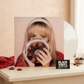 BVRS de Fruitcake con vinilo blanco translúcido en una escena cálida inspirada en la portada