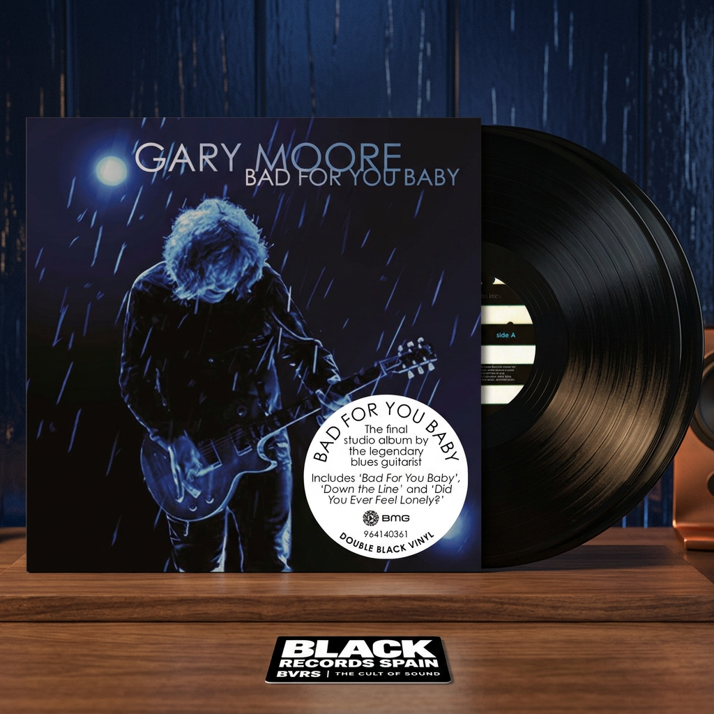 Escena editorial BVRS cálida de Gary Moore Bad For You Baby con portada y dos vinilos negros protagonistas