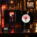 Vinilo negro Dance With Me con funda de cabina telefónica en una escena nocturna de Black Vinyl Records Spain