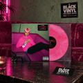 Vinilo rosa de Lil Peep en una escena BVRS con sofá magenta, cartel y tarjeta de Black Vinyl Records Spain.
