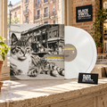 Billy Bragg & Wilco - Mermaid Avenue Vol. II con vinilo blanco en una escena editorial BVRS