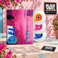 R.E.M. Reveal con tres CD en una escena rosa luminosa de Black Vinyl Records Spain