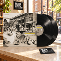 Billy Bragg & Wilco - Mermaid Avenue Vol. II con dos vinilos negros en una escena editorial BVRS
